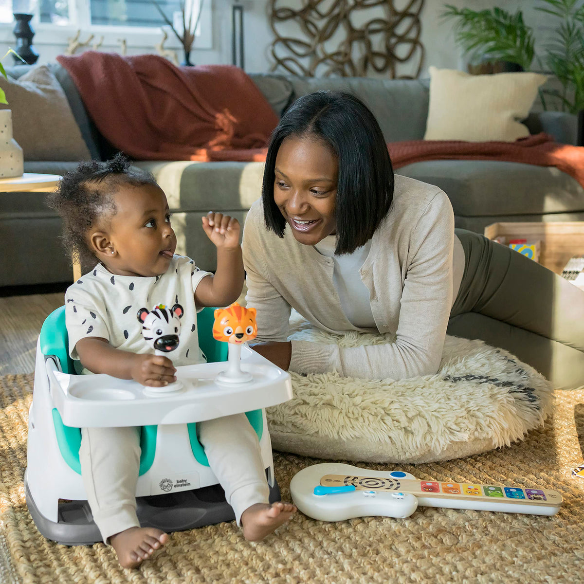 Booster Feeding & Floor Activity Seat with Self-Storing Tray B237